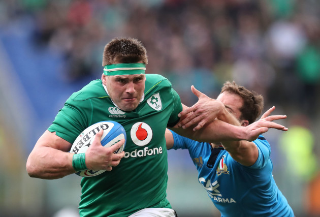 CJ Stander shrugs off an Italy tackler