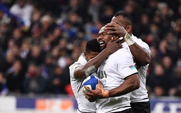Fiji celebrate their win over France