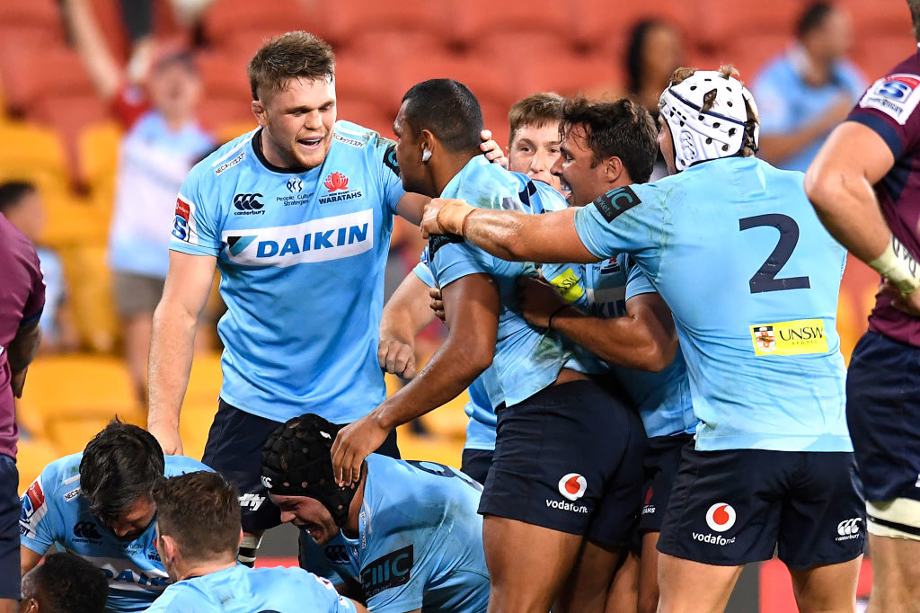 Determined Tahs overcome Reds