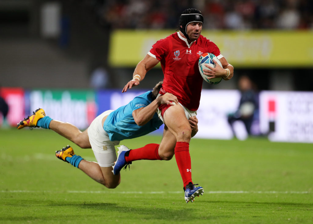 Leigh Halfpenny of Wales is tackled by Tomas Inciarte of Uruguay