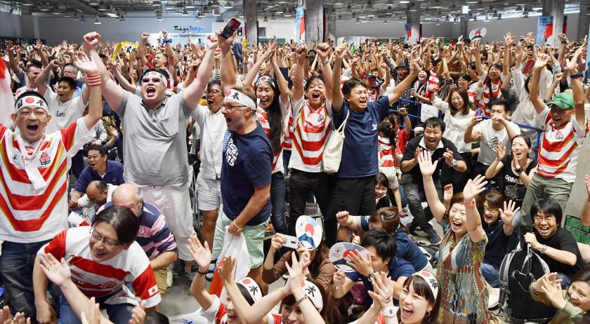 Japan and Scotland fans during the match