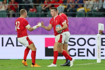 Wales wing Josh Adams celebrates one of his tries