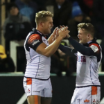 Duhan van der Merwe celebrates with a teammate