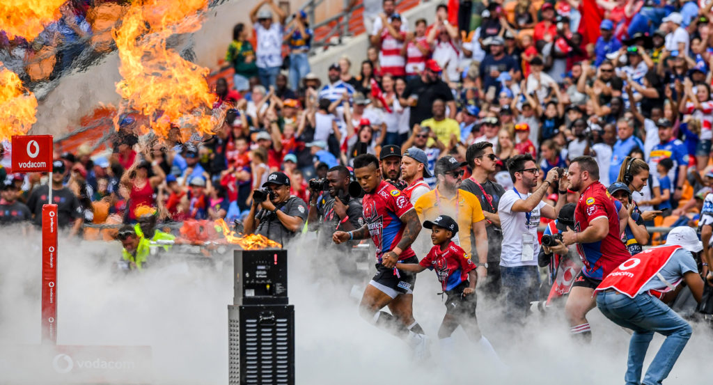 Lions players take the field during the SuperHero Sunday match between Vodacom Bulls and Emirates Lions at FNB Stadium