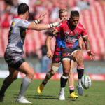 Lions pivot Elton Jantjies kicks for his players to chase