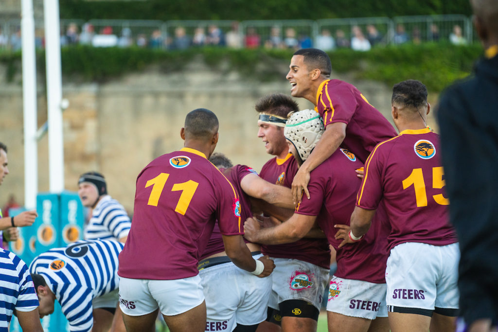 Maties celebrate a try against UCT in 2019 Varsity Cup