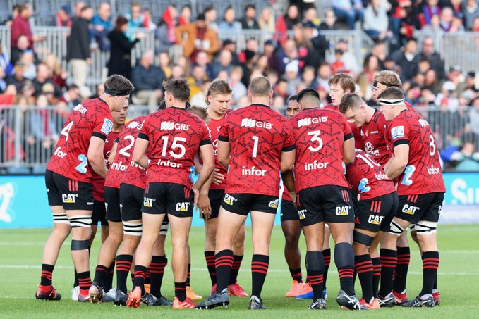 The Crusaders in a huddle