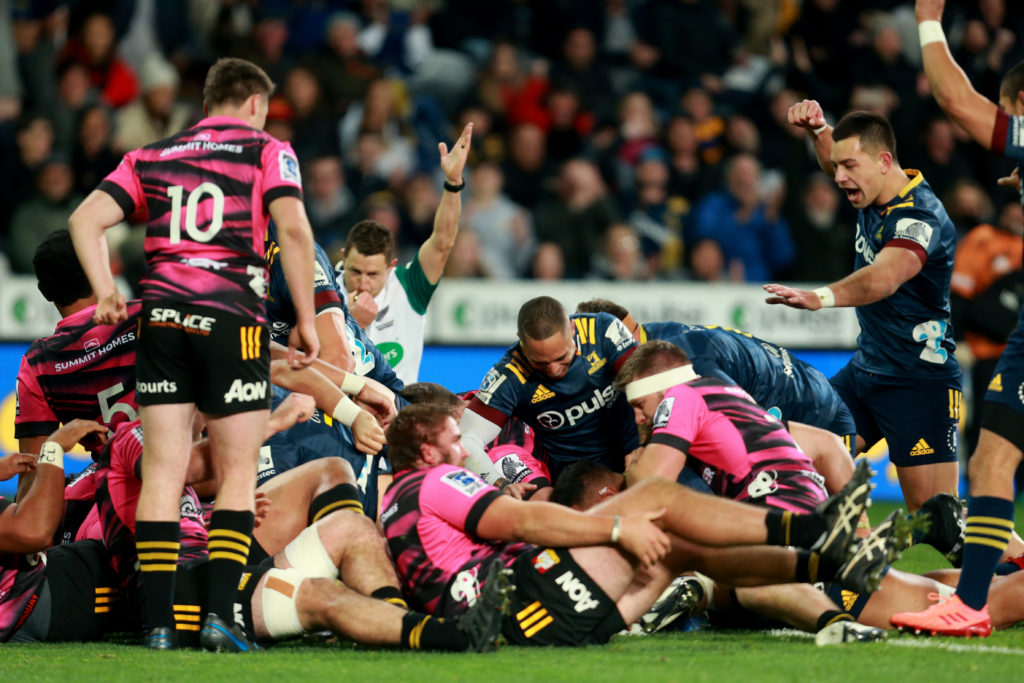 The Highlanders celebrate a try