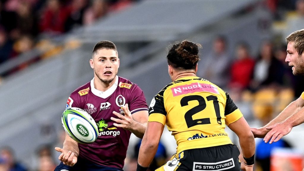 BRISBANE, AUSTRALIA - JULY 17: James O'Connor of the Reds passes the ball during the round three Super Rugby AU match between the Reds and Force at Suncorp Stadium on July 17, 2020 in Brisbane, Australia. (Photo by Bradley Kanaris/Getty Images)