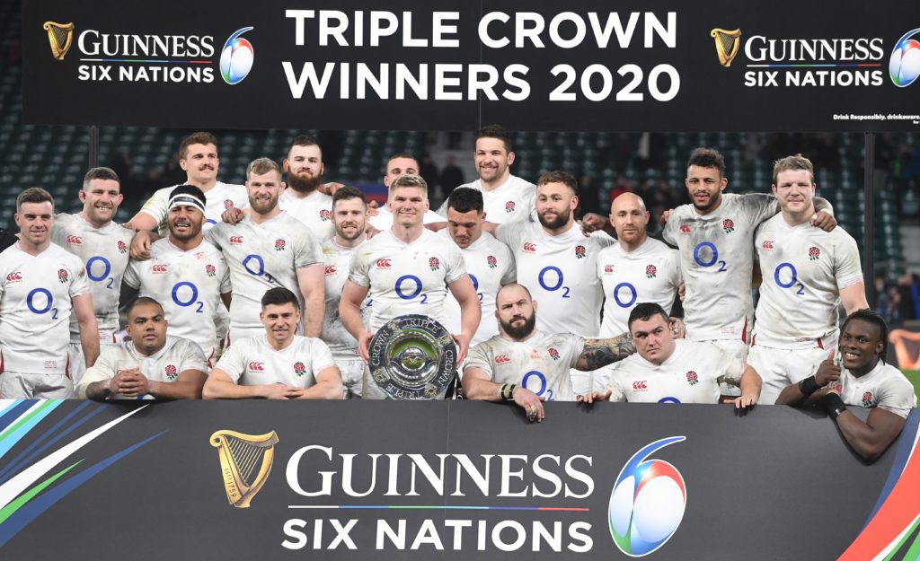 epa08277223 England poses with the Triple Crown trophy after winning the Six Nations rugby match between England and Wales held at Twickenham stadium in London, Britain, 07 March 2020. EPA/FACUNDO ARRIZABALAGA