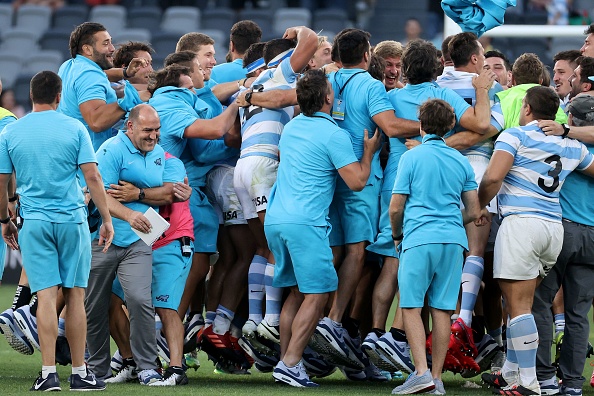Argentina's coach Mario Ledesma (L) celebrates victory with team members at the end of the 2020 Tri-Nations rugby match between the New Zealand and Argentina at Bankwest Stadium in Sydney on November 14, 2020. (Photo by David Gray / AFP) / / IMAGE RESTRICTED TO EDITORIAL USE - STRICTLY NO COMMERCIAL USE (Photo by DAVID GRAY/AFP via Getty Images)