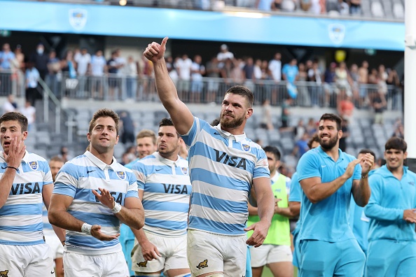 Argentina's Marcos Kremer (C) celebrates victory with teammates at the end of 2020 Tri-Nations rugby match between the New Zealand and Argentina at Bankwest Stadium in Sydney on November 14, 2020. (Photo by David Gray / AFP) / / IMAGE RESTRICTED TO EDITORIAL USE - STRICTLY NO COMMERCIAL USE (Photo by DAVID GRAY/AFP via Getty Images)