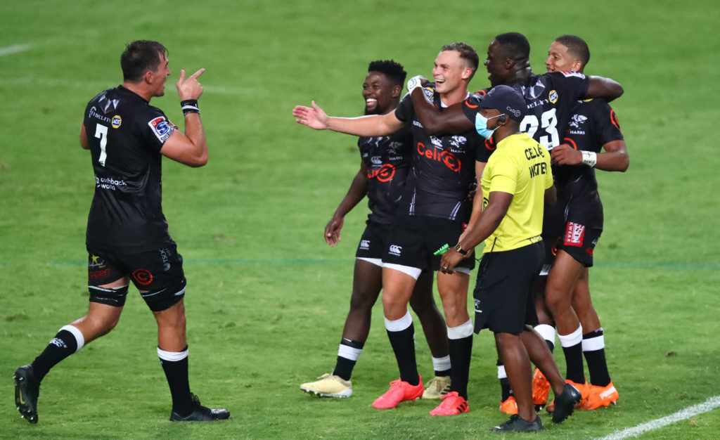Curwin Bosch celebrates with his Sharks teammates