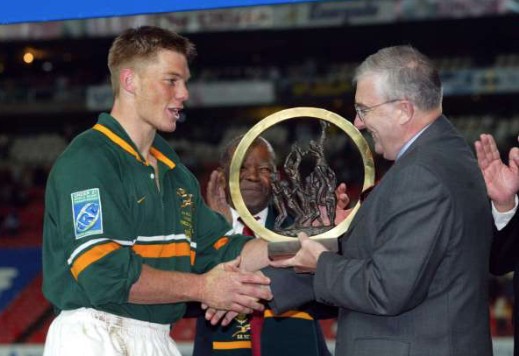 Former Junior Springbok captain Clyde Rathbone receives the U21 World Champs trophy