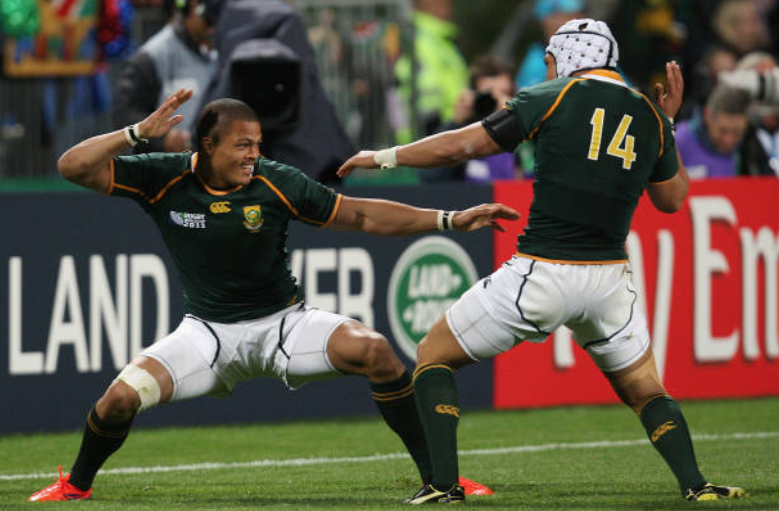 Juan de Jongh celebrates after scoring a try for the Springboks