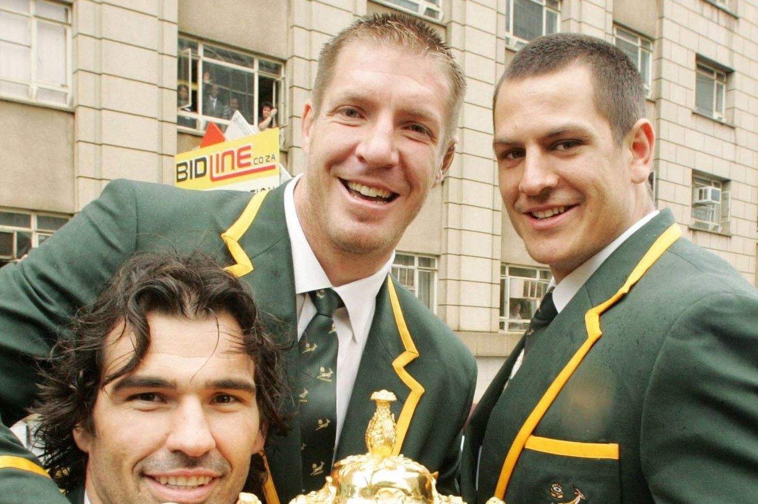 SOUTH AFRICA - OCTOBER 26: Victor Matfield, Bakkies Botha and Pierre Spies of South Africa hold the Webb-Ellis Cup during the Springboks Rugby World Cup victory parade between Pretoria and Johannesburg, on October 26, 2007 in South Africa. (Photo by Duif du Toit/Gallo Images/Getty Images)