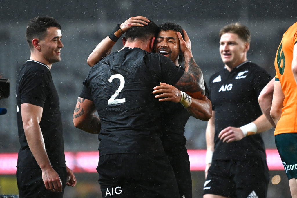 AUCKLAND, NEW ZEALAND - AUGUST 14: Richie Mo'unga of the All Blacks celebrates a try to Codie Taylor during The Rugby Championship and Bledisloe Cup match between the New Zealand All Blacks and the Australian Wallabies at Eden Park on August 14, 2021 in Auckland, New Zealand.