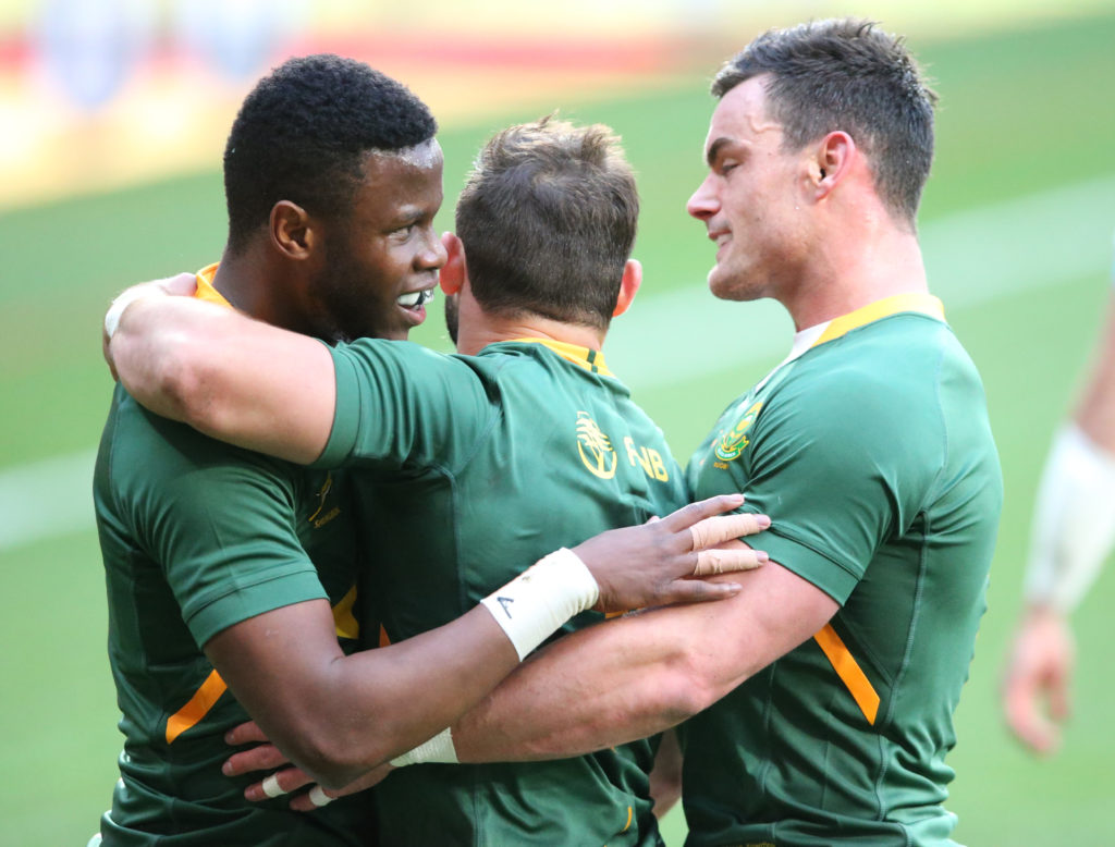 GQEBERHA, SOUTH AFRICA - AUGUST 14: Aphelele Fassi of South Africa and Jesse Kriel congratulate Cobus Reinach of South Africa during the Castle Lager Rugby Championship match between South Africa and Argentina at Nelson Mandela Bay Stadium on August 14, 2021 in Gqeberha, South Africa.