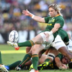 Faf de Klerk of the Springboks (C) kicks the ball during the Rugby Championship Round 5 match between New Zealand's All Blacks and South Africa's Springboks at Queensland Country Bank Stadium in Townsville, Queensland, Australia, 25 September 2021. EPA/DARREN ENGLAND AUSTRALIA AND NEW ZEALAND OUT