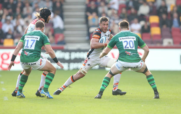 BRENTFORD, ENGLAND - OCTOBER 09: Leicester Tigers's Hanro Liebenberg takes on London Irish's George Nott during the Gallagher Premiership Rugby match between London Irish and Leicester Tigers at Brentford Community Stadium on October 9, 2021 in Brentford, England.