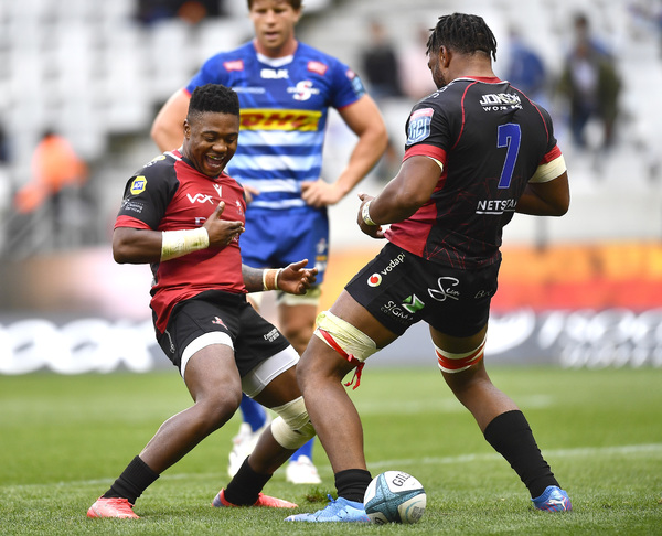 CAPE TOWN, SOUTH AFRICA - DECEMBER 04: Vincent Tshituka and Wandisile Simelane of the Lions celebrate after scoring a try during the United Rugby Championship match between DHL Stormers and Emirates Lions at DHL Stadium on December 04, 2021 in Cape Town, South Africa.