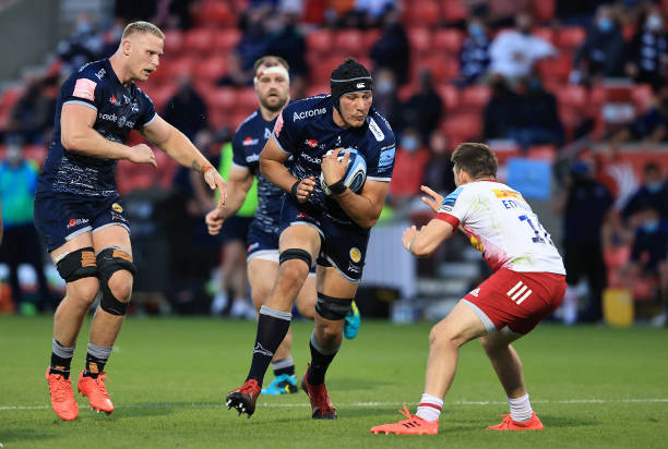 SALFORD, ENGLAND - JUNE 04: JP du Preez of Sale Sharks takes on Will Edwards during the Gallagher Premiership Rugby match between Sale Sharks and Harlequins at the AJ Bell Stadium on June 04, 2021 in Salford, England.