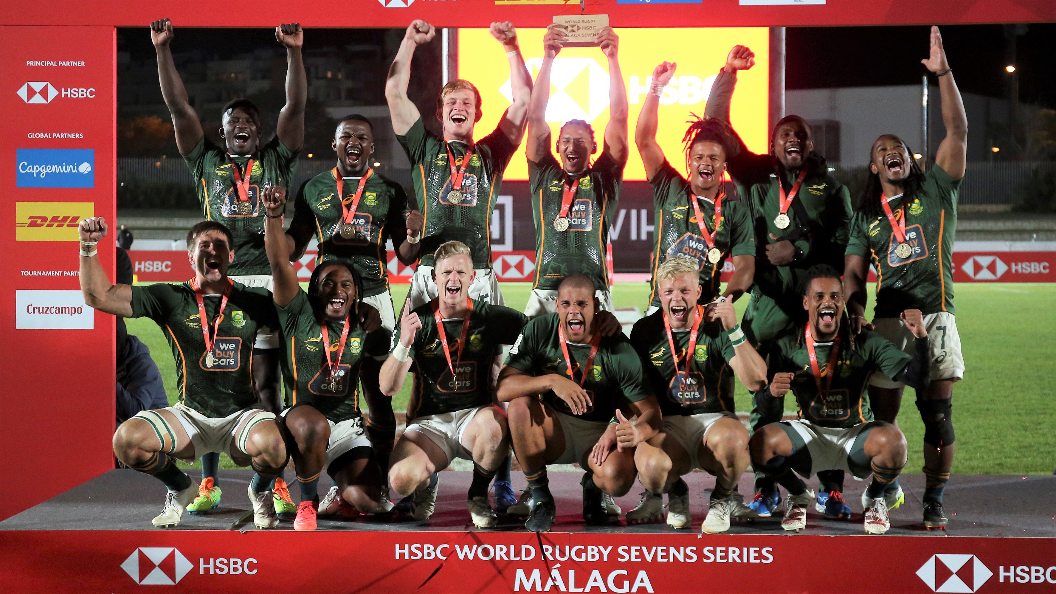 epa09705417 South African players celebrate their gold medal following their victory against Argentina on their at the HSBC World Rugby Sevens series match held in Malaga, Spain, 23 January 2022. EPA/DANIEL PEREZ