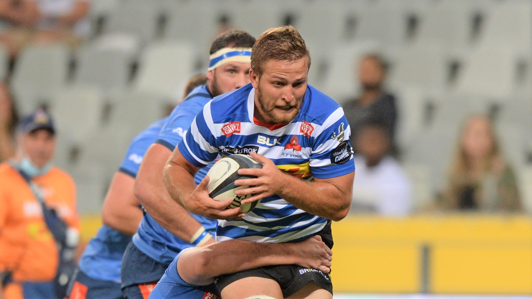 Marcel Theunissen of Western Province is tackled by Marcell Coetzee of the Bulls during the Carling Currie Cup 2022 game between Western Province and the Bulls at Cape Town Stadium on 19 January 2022 ©Ryan Wilkisky/BackpagePix