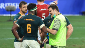 CAPE TOWN, SOUTH AFRICA - JULY 31: Rassie Erasmus, the Springboks director of rugby acting as a water carrier talks to his captain Siya Kolisi during the 2nd test match between South Africa Springboks and the British & Irish Lions at Cape Town Stadium on July 31, 2021 in Cape Town, South Africa.