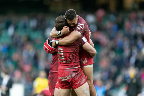 Cheslin Kolbe and Antoine Dupont (c) celebrates after winning the European Champions Cup match between La Rochelle and Toulouse at Twickenham Stadium, London, England on 22nd May 2021.