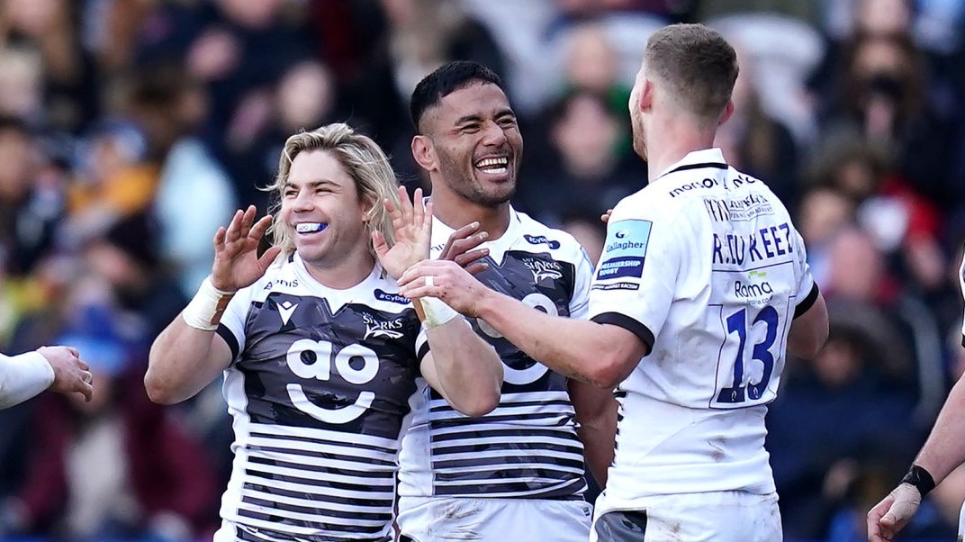 Sale Sharks' Faf de Klerk (centre) celebrates with team-mates after victory in the Gallagher Premiership match at Twickenham Stoop, London. Picture date: Sunday February 6, 2022. (Photo by John Walton/PA Images via Getty Images)