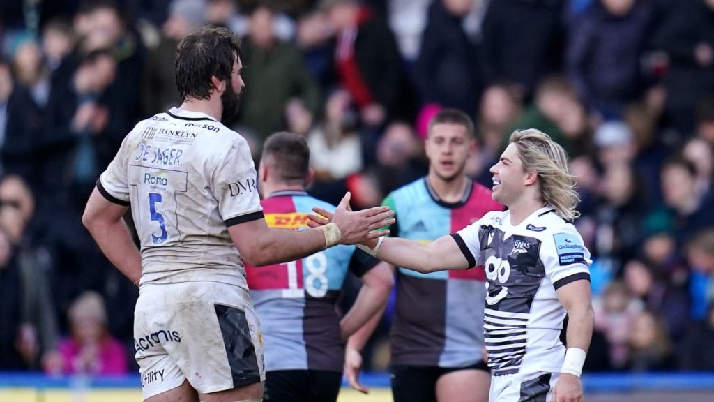 Sale Sharks' Faf de Klerk (right) and Lood de Jager celebrate victory after the final whistle in the Gallagher Premiership match at Twickenham Stoop, London. Picture date: Sunday February 6, 2022. (Photo by John Walton/PA Images via Getty Images)
