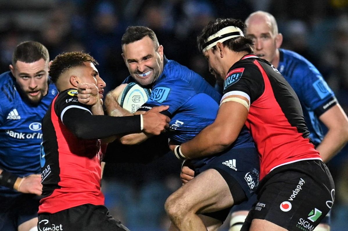 Dublin , Ireland - 25 February 2022; Dave Kearney of Leinster is tackled by Jordan Hendrikse and PJ Steenkamp of Emirates Lions during the United Rugby Championship match between Leinster and Emirates Lions at RDS Arena in Dublin. (Photo By Harry Murphy/Sportsfile via Getty Images)