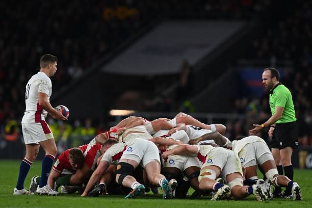 England's scrum-half Ben Youngs (L) prepares to put the ball into the scrum during the Six Nations international rugby union match between England and Wales at Twickenham Stadium, west London, on February 26, 2022.