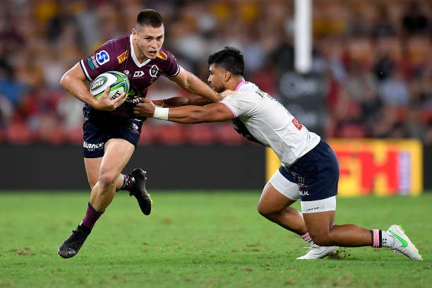 BRISBANE, AUSTRALIA - FEBRUARY 26: James O'Connor of the Reds runs with the ball during the round two Super RugbyAU match between the Melbourne Rebels and the Queensland Reds at Suncorp Stadium, on February 26, 2021, in Brisbane, Australia.