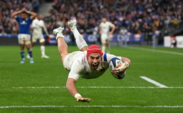 PARIS, FRANCE - FEBRUARY 06: France player Gabin Villiere dives over to score the third France try during the Guinness Six Nations match between France and Italy at Stade de France on February 06, 2022 in Paris, France.