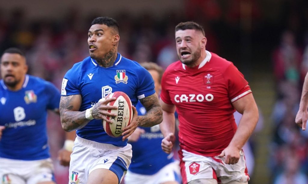 Italy's Monty Ioane breaks away during the Guinness Six Nations match at the Principality Stadium, Cardiff. Picture date: Saturday March 19, 2022. (Photo by Mike Egerton/PA Images via Getty Images)