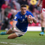 Italy's Edoardo Padovani dives in to score his sides first try during the Guinness Six Nations match at the Principality Stadium, Cardiff. Picture date: Saturday March 19, 2022.