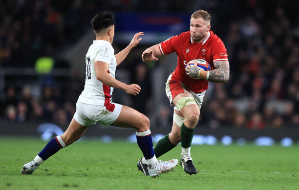 LONDON, ENGLAND - FEBRUARY 26: Ross Moriarty of Wales takes on Marcus Smith during the Guinness Six Nations Rugby match between England and Wales at Twickenham Stadium on February 26, 2022 in London, England.