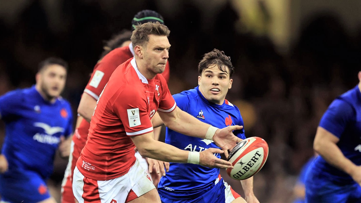 CARDIFF, WALES - MARCH 11: Dan Biggar of Wales is watched by Antoine Dupont of France during the Guinness Six Nations Rugby match between Wales and France at Principality Stadium on March 11, 2022 in Cardiff, Wales. (Photo by David Rogers/Getty Images)
