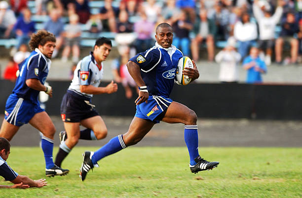 WHANGAREI, NEW ZEALAND - FEBRUARY 08: Blues Player Rupeni Caucaunibuca breaks away for another try during the Rugby Super 12 warmup game, the Blues vs the Waratahs played in Whangarei, Friday.