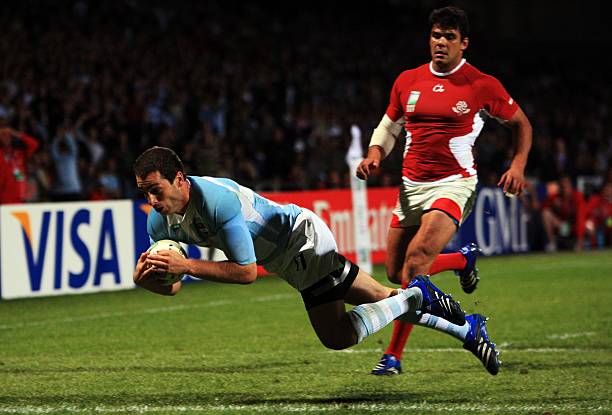 LYON, FRANCE - SEPTEMBER 11: Federico Martin Aramburu of Argentina scores a try during match nine of the Rugby World Cup 2007 between Argentina and Georgia at the Gerland stadium on September 11, 2007 in Lyon, France.