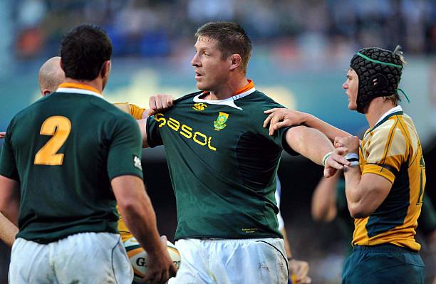 CAPE TOWN, SOUTH AFRICA - AUGUST 08: Bakkies Botha of South Africa in a tussel with Australian players during the Tri Nations match between South Africa and Australia held at Newland Stadium on August 8, 2009 in Cape Town, South Africa.