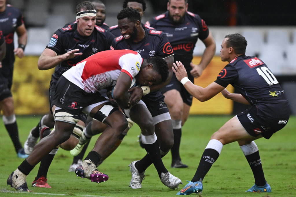 Bosch singing in the rain as Sharks maul Lions