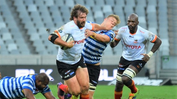 CAPE TOWN, SOUTH AFRICA - APRIL 15: Frans Steyn of Toyota Cheetahs hands off Connor Evans of DHL Western Province during the Carling Currie Cup match between DHL Western Province and Toyota Cheetahs at DHL Stadium on April 15, 2022 in Cape Town, South Africa. (Photo by Grant Pitcher/Gallo Images)