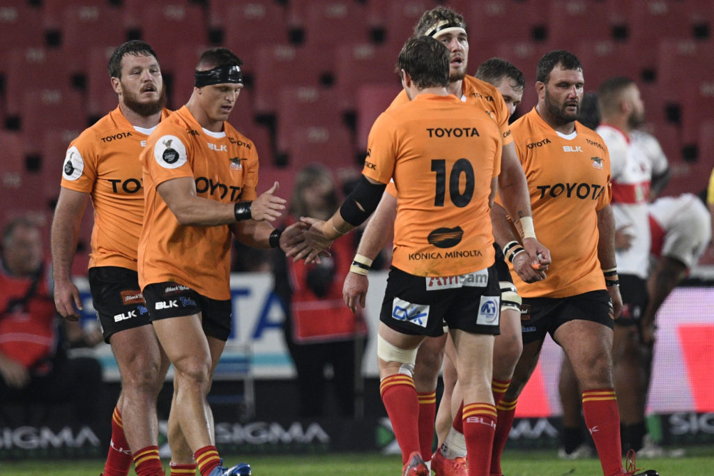 Cheetahs players celebrate a try