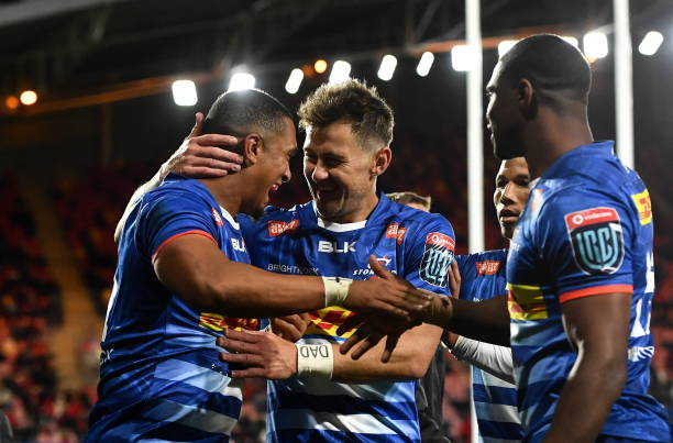 Limerick , Ireland - 2 October 2021; Leolin Zas of DHL Stormers, left, celebrates with team-mates, including Stefan Ungerer, centre, after scoring his side's second try during the United Rugby Championship match between Munster and DHL Stormers at Thomond Park in Limerick.