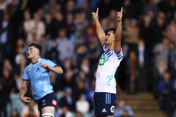 SYDNEY, AUSTRALIA - MAY 28: Zarn Sullivan of the Blues celebrates kicking the winning field goal after the siren during the round 15 Super Rugby Pacific match between the NSW Waratahs and the Blues at Leichhardt Oval on May 28, 2022 in Sydney, Australia.