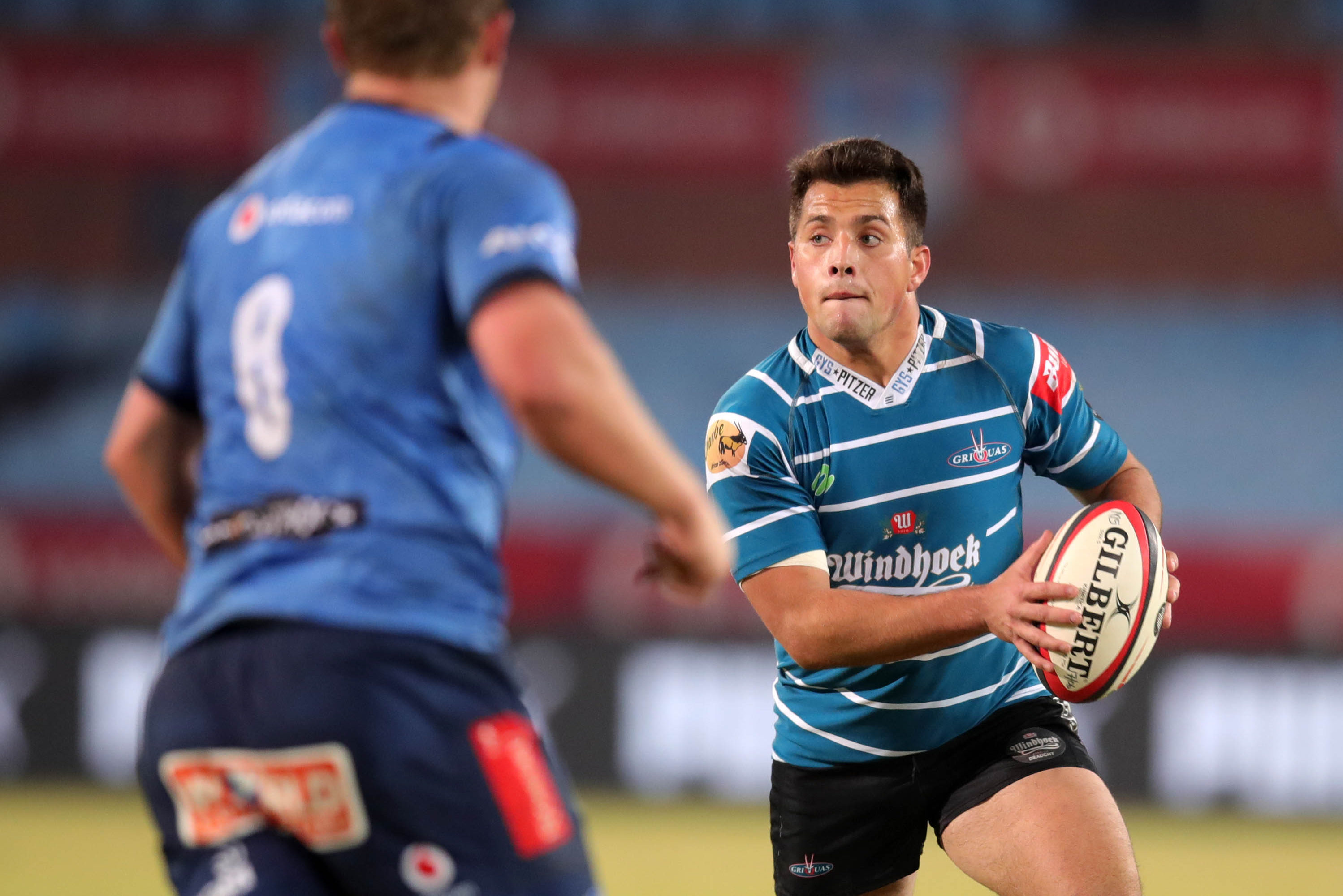 Rynhardt Jonker of the Griquas challenged by Muller Uys of the Bulls during the Carling Currie Cup 2022 semifinal match between Bulls and Griquas at Loftus Versfeld Stadium, Pretoria on 17 June 2022 ©Samuel Shivambu/BackpagePix