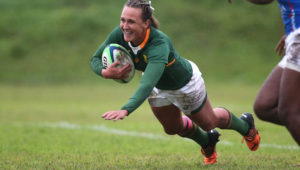 Elizabetha Janse van Rensburg of South Africa dives over to score a try during the 2022 Rugby Africa Women's Cup match between South Africa Women and Namibia Women held at City Park in Cape Town on 23 June 2022